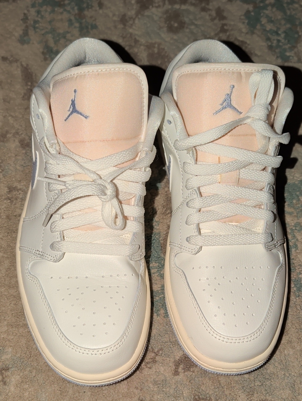 Women's Nike Air Jordan 1 Low in the sought-after "Sail / Ghost" colorway